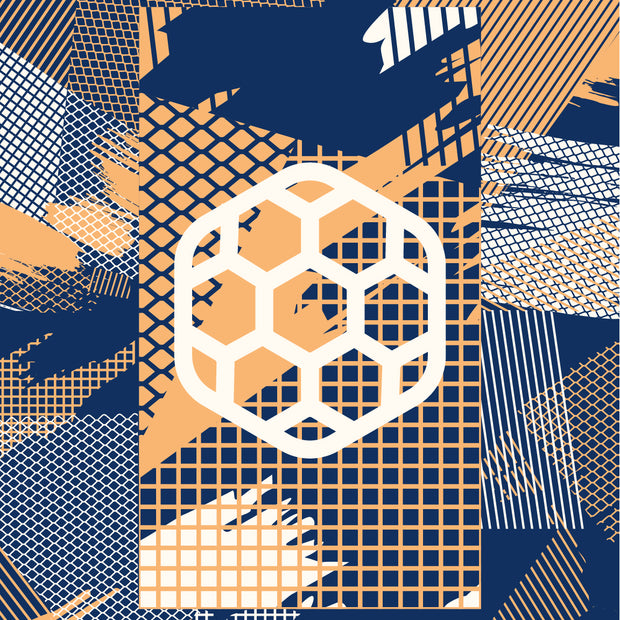 Juggler Towel laid flat, a navy and orange abstract print with a hexagon soccer ball and Soccer Crate lettering
